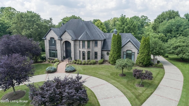 7202 Doe Crest Ct, Prospect, KY 40059 - french provincial home featuring brick siding and a front yard