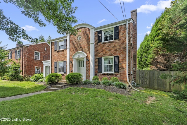 2628 Landor Ave, Louisville, KY 40205 - view of front of house with a chimney and brick siding