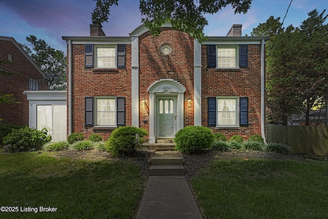 2628 Landor Ave, Louisville, KY 40205 - view of front facade featuring a chimney and brick siding