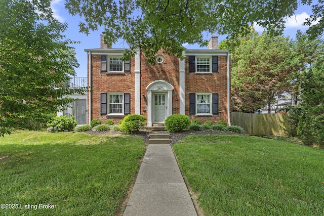 2628 Landor Ave, Louisville, KY 40205 - view of front of property with a chimney and brick siding