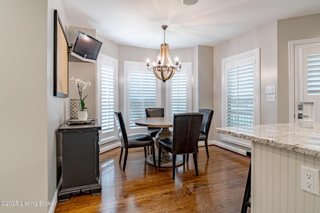 17503 Polo Run Ln, Louisville, KY 40245 - dining area with a chandelier and dark wood-style floors