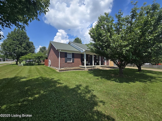 306 Butler Dr, Bardstown, KY 40004 - view of front facade featuring brick siding and a front lawn