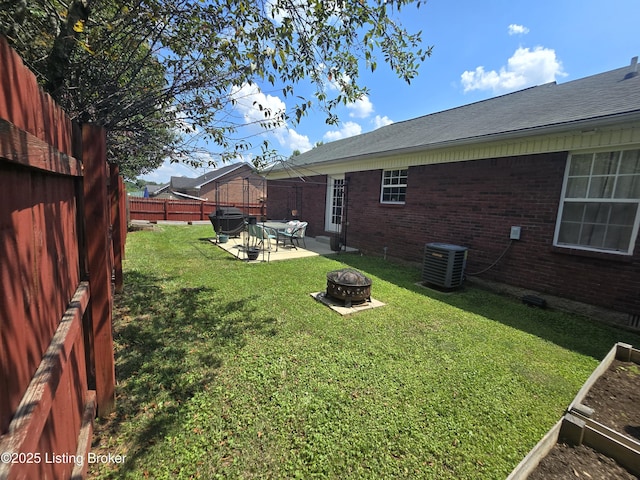 306 Butler Dr, Bardstown, KY 40004 - fenced backyard featuring an outdoor fire pit and a patio area