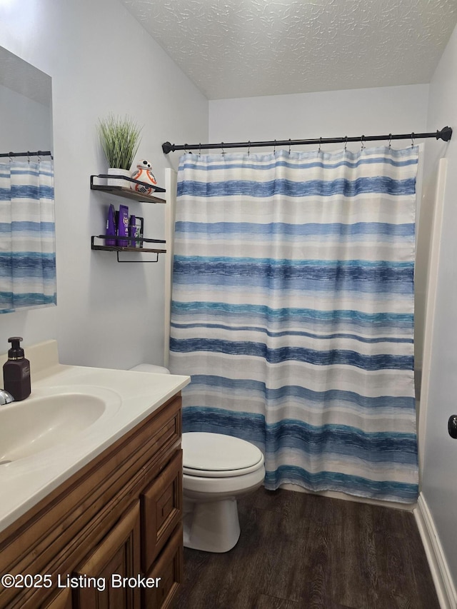 306 Butler Dr, Bardstown, KY 40004 - full bathroom with wood finished floors, a textured ceiling, and vanity