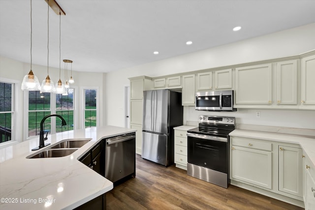3107 Salt Lick Rd, Crestwood, KY 40014 - kitchen with stainless steel appliances, pendant lighting, dark wood finished floors, recessed lighting, and light stone counters