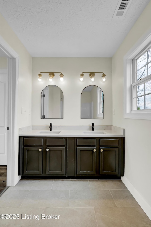 3107 Salt Lick Rd, Crestwood, KY 40014 - full bath with double vanity, tile patterned flooring, and a textured ceiling
