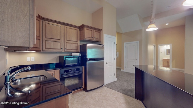 5407 Merribrook Ln, Prospect, KY 40059 - kitchen featuring black oven, freestanding refrigerator, dark countertops, pendant lighting, and light carpet