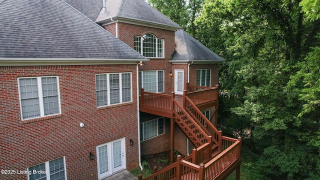 5407 Merribrook Ln, Prospect, KY 40059 - back of house with a shingled roof, brick siding, stairs, and a deck