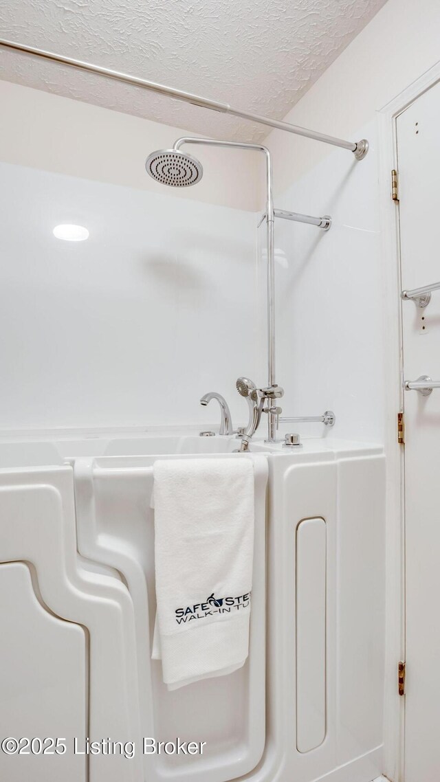 3030 Breckenridge Ln Apt 201, Louisville, KY 40220 - full bathroom with a textured ceiling and a shower