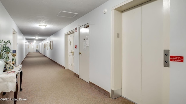 3030 Breckenridge Ln Apt 201, Louisville, KY 40220 - corridor with elevator, light carpet, and attic access