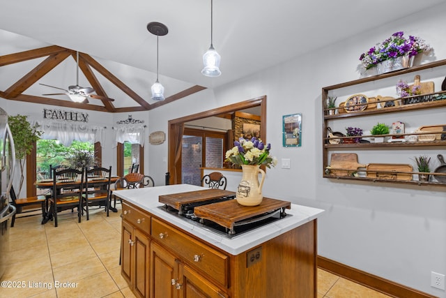509 Oak Branch Rd, Louisville, KY 40245 - kitchen with light tile patterned flooring, lofted ceiling, light countertops, ceiling fan, and brown cabinetry