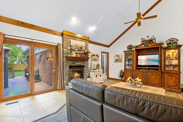 509 Oak Branch Rd, Louisville, KY 40245 - living area with high vaulted ceiling, a fireplace, a ceiling fan, recessed lighting, and light tile patterned flooring