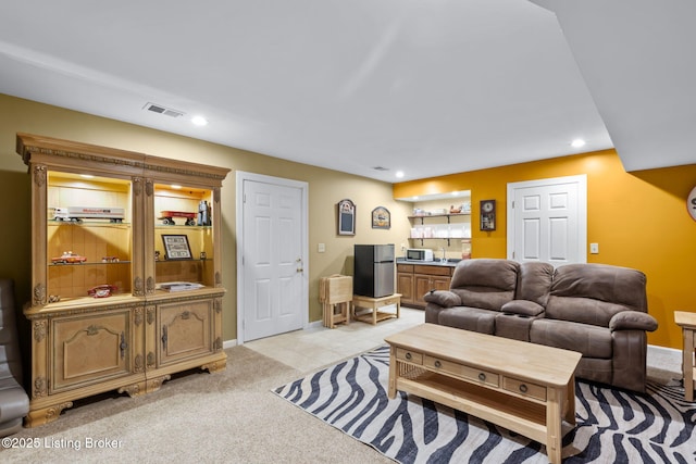 509 Oak Branch Rd, Louisville, KY 40245 - living room featuring wet bar, recessed lighting, and light carpet