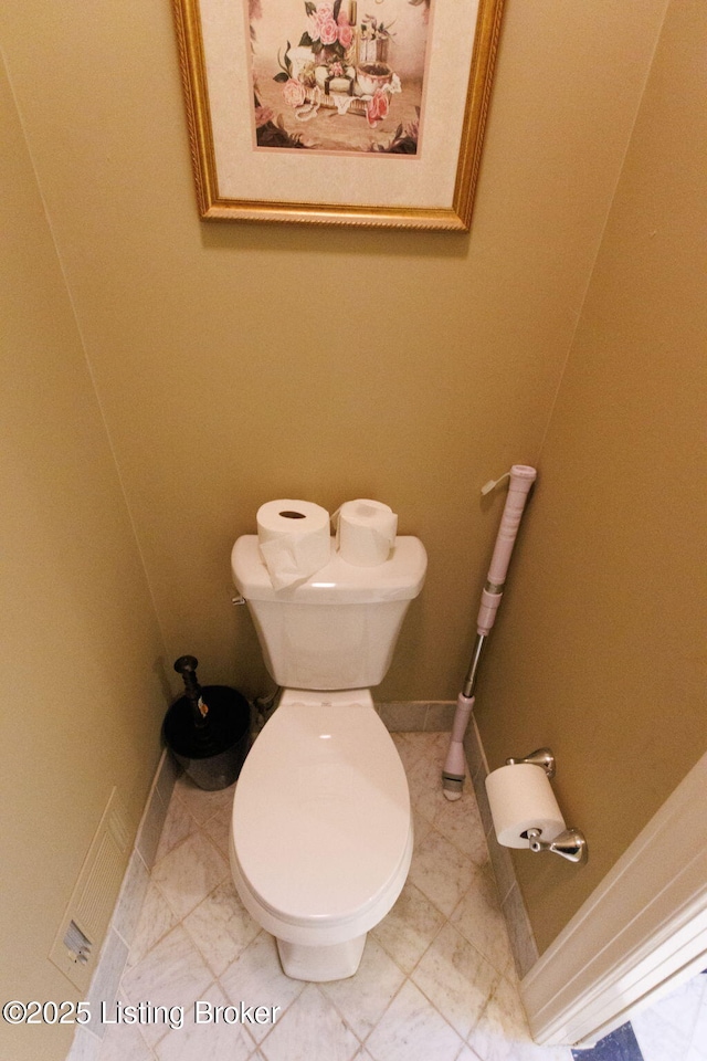 509 Oak Branch Rd, Louisville, KY 40245 - bathroom featuring toilet and baseboards