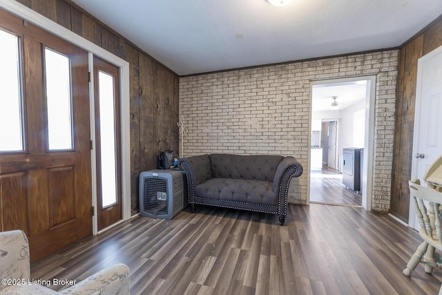 469 Ardmore Ln, Shelbyville, KY 40065 - entrance foyer featuring wood finished floors, wood walls, and brick wall