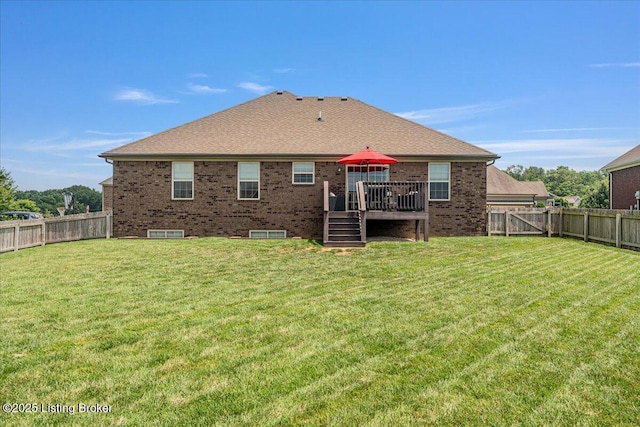 1105 Deer Fields Trce, La Grange, KY 40031 - rear view of house with a fenced backyard, a deck, and brick siding