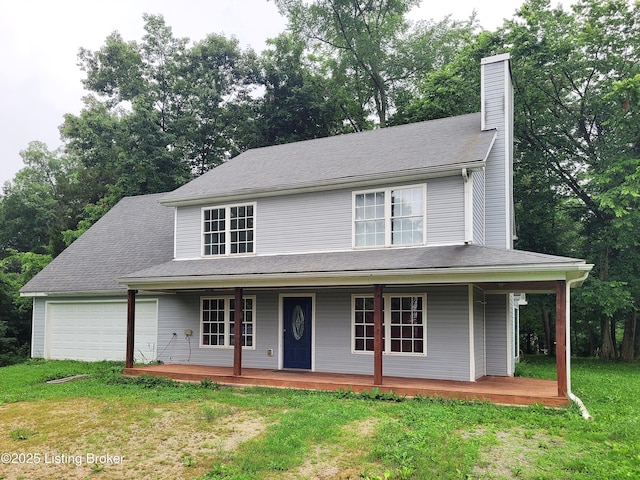 1707 N Stillwell Rd, Boston, KY 40107 - view of front facade with a porch, a chimney, a front lawn, and an attached garage