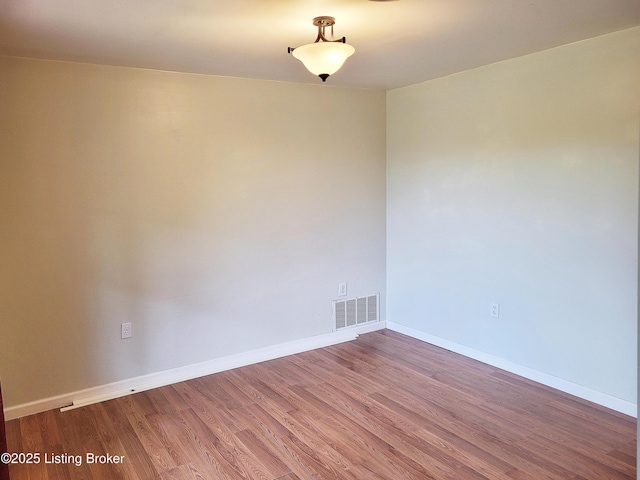 1707 N Stillwell Rd, Boston, KY 40107 - spare room with wood finished floors and baseboards