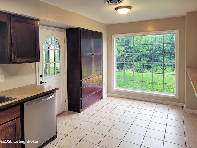 1707 N Stillwell Rd, Boston, KY 40107 - kitchen featuring dishwasher, light tile patterned floors, and dark brown cabinets