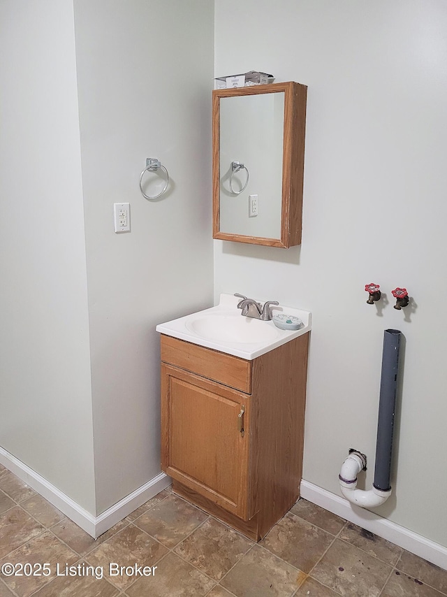 1707 N Stillwell Rd, Boston, KY 40107 - bathroom featuring vanity and baseboards