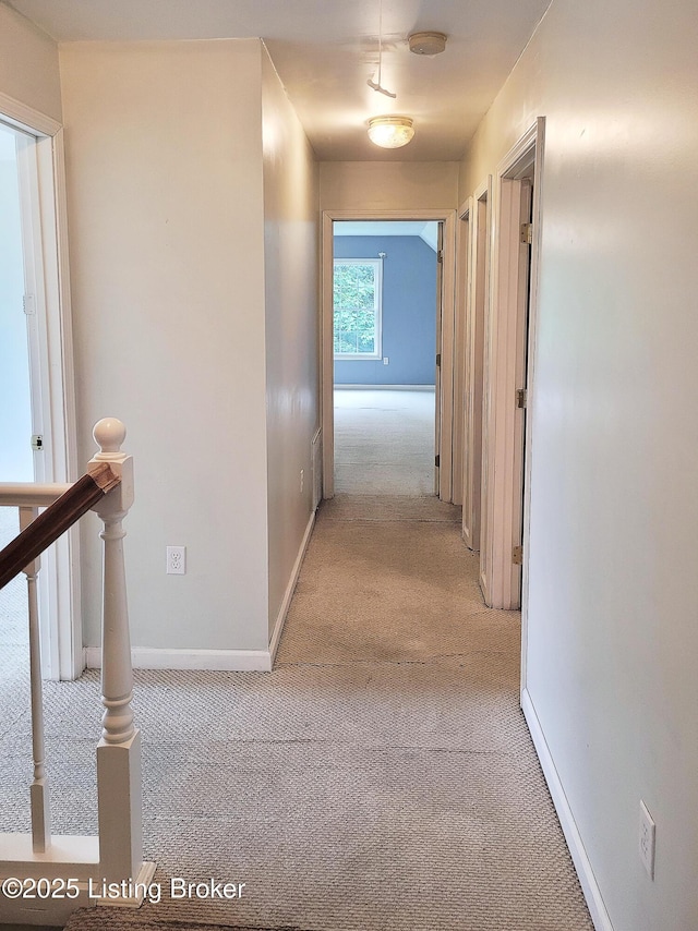 1707 N Stillwell Rd, Boston, KY 40107 - hallway featuring light carpet and an upstairs landing