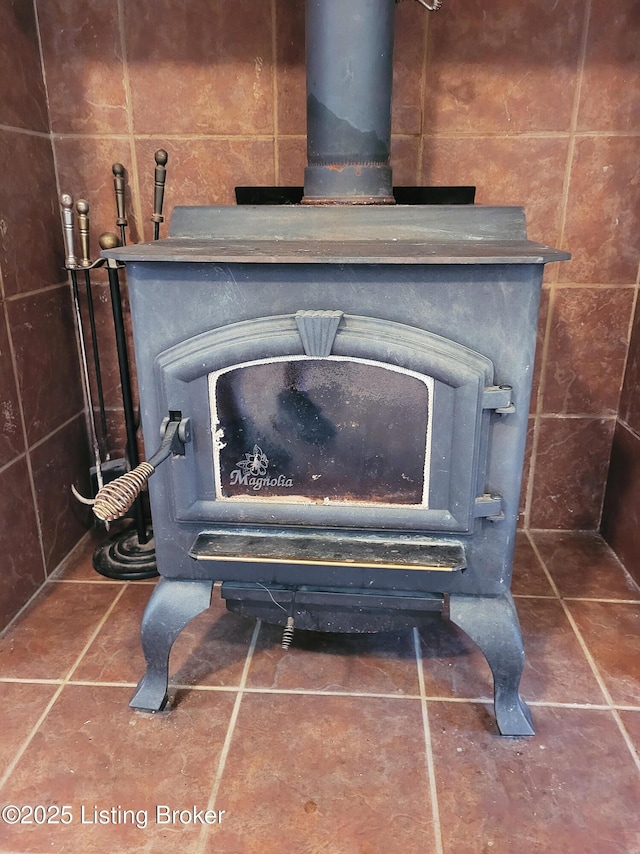 1707 N Stillwell Rd, Boston, KY 40107 - detailed view of a wood stove and tile walls