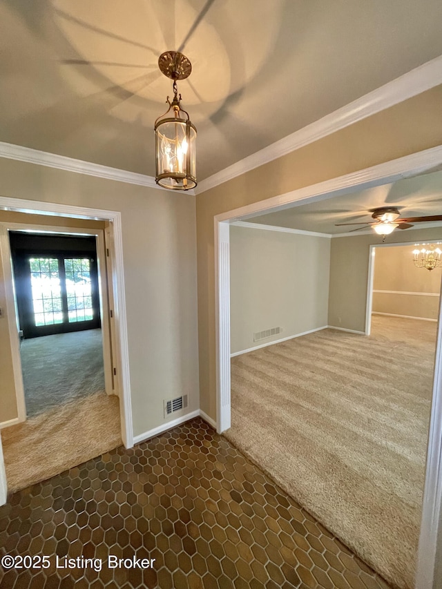 2804 Creekside Dr, Louisville, KY 40241 - unfurnished room featuring dark carpet, crown molding, a chandelier, and ceiling fan