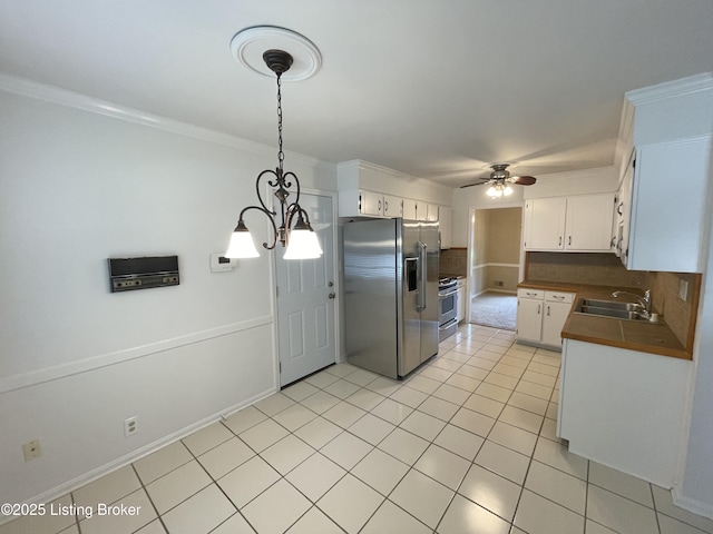2804 Creekside Dr, Louisville, KY 40241 - kitchen featuring appliances with stainless steel finishes, a ceiling fan, dark countertops, light tile patterned flooring, and white cabinets