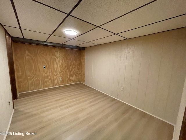 2804 Creekside Dr, Louisville, KY 40241 - finished basement with wood finished floors, a drop ceiling, and wood walls