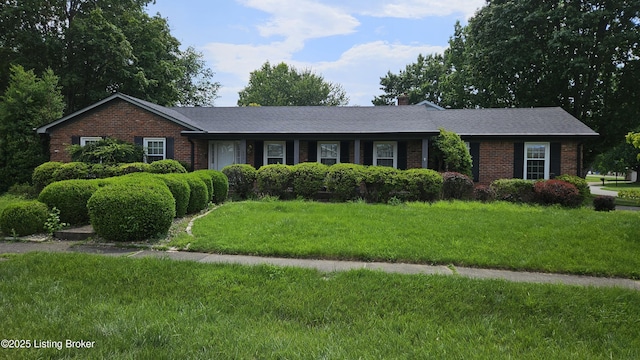 2804 Creekside Dr, Louisville, KY 40241 - ranch-style home featuring brick siding, a front yard, and a chimney