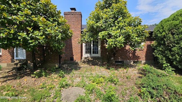 2804 Creekside Dr, Louisville, KY 40241 - view of property exterior with brick siding and a chimney