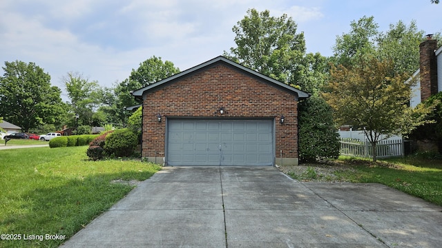 2804 Creekside Dr, Louisville, KY 40241 - view of side of property with brick siding, a garage, and concrete driveway