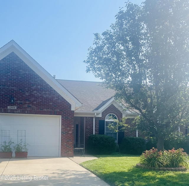 12608 Spring Heaven Ct, Louisville, KY 40229 - single story home with brick siding, a front lawn, driveway, an attached garage, and a shingled roof
