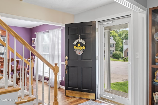 1403 Cadence Ct, Louisville, KY 40222 - entryway with stairway and wood finished floors
