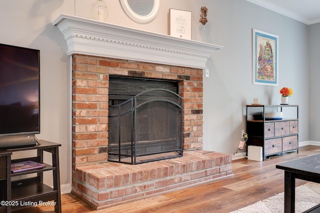 1403 Cadence Ct, Louisville, KY 40222 - detailed view of wood finished floors, crown molding, and a fireplace