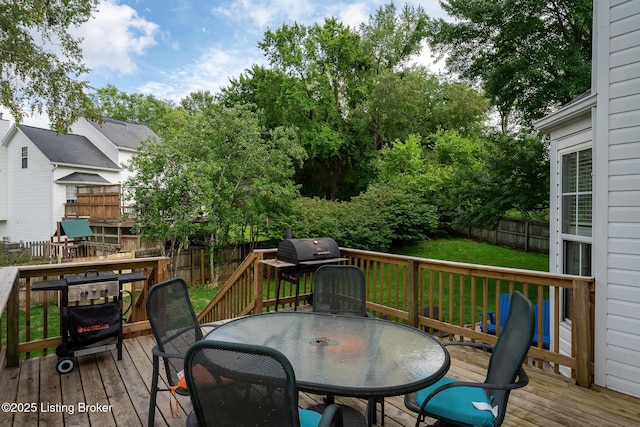 1403 Cadence Ct, Louisville, KY 40222 - wooden deck with outdoor dining space and a fenced backyard