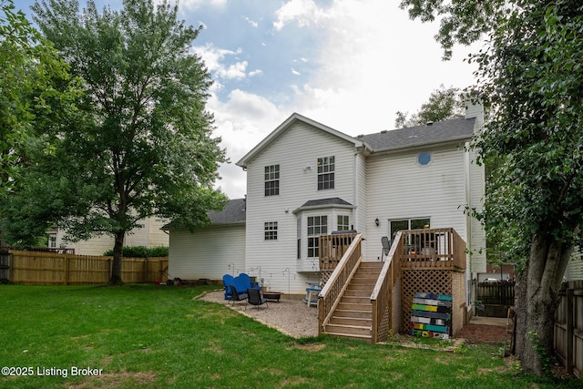 1403 Cadence Ct, Louisville, KY 40222 - back of property with a fenced backyard, stairs, a deck, a patio area, and a chimney