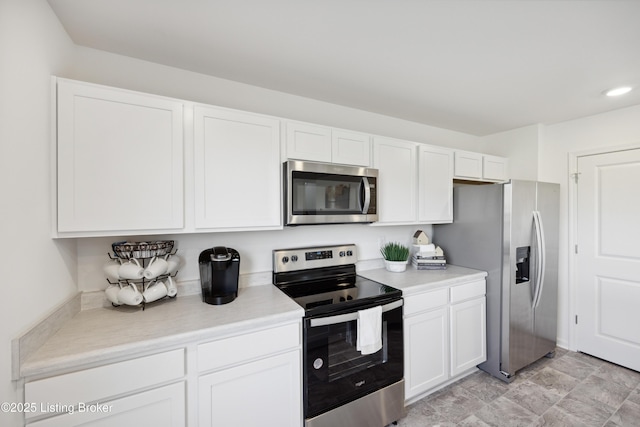1520 Robin Rd, Shelbyville, KY 40065 - kitchen featuring stainless steel appliances, white cabinets, and light countertops