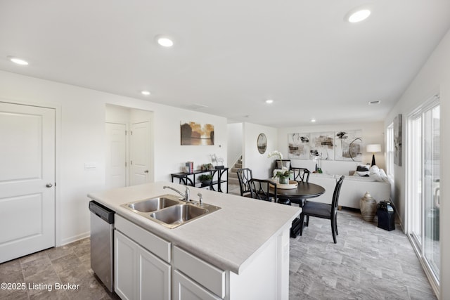 1520 Robin Rd, Shelbyville, KY 40065 - kitchen with stainless steel dishwasher, light countertops, recessed lighting, a center island with sink, and open floor plan