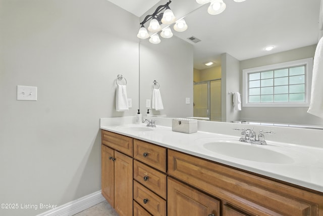 3416 Sasse Way, Louisville, KY 40245 - bathroom with double vanity, a stall shower, and tile patterned flooring
