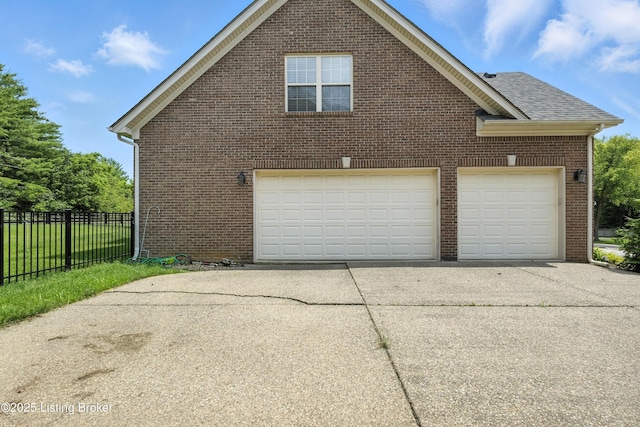 3416 Sasse Way, Louisville, KY 40245 - view of side of property featuring concrete driveway, brick siding, and a garage