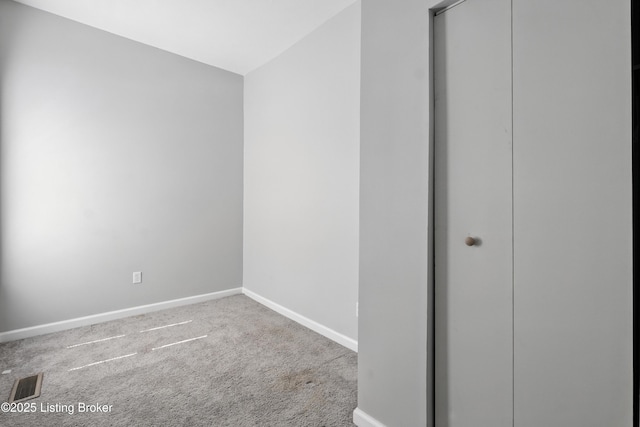 940 Dixie Hwy, Louisville, KY 40210 - carpeted empty room featuring baseboards