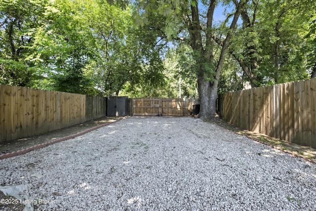 940 Dixie Hwy, Louisville, KY 40210 - view of yard with a gate and driveway