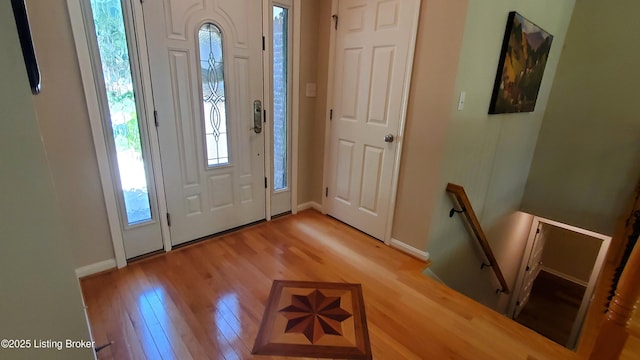 4318 Juniper Forest Pl, Louisville, KY 40245 - foyer entrance with light wood finished floors and plenty of natural light