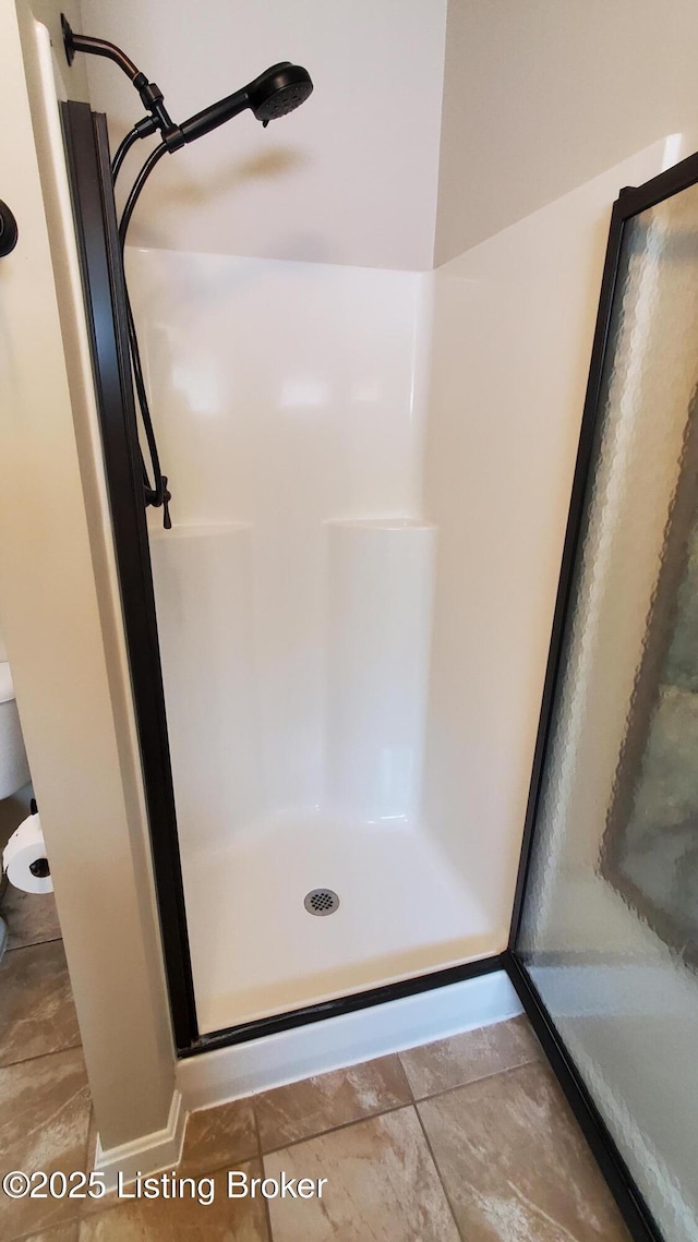 4318 Juniper Forest Pl, Louisville, KY 40245 - full bath featuring a stall shower and tile patterned flooring