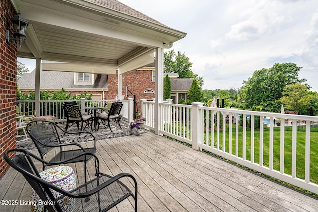 15018 Forest Oaks Dr, Louisville, KY 40245 - deck featuring outdoor dining space and a lawn