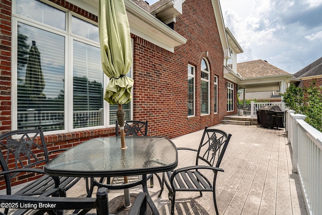 15018 Forest Oaks Dr, Louisville, KY 40245 - view of patio featuring a wooden deck, outdoor dining space, and a grill