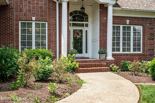 15018 Forest Oaks Dr, Louisville, KY 40245 - doorway to property featuring brick siding and a shingled roof