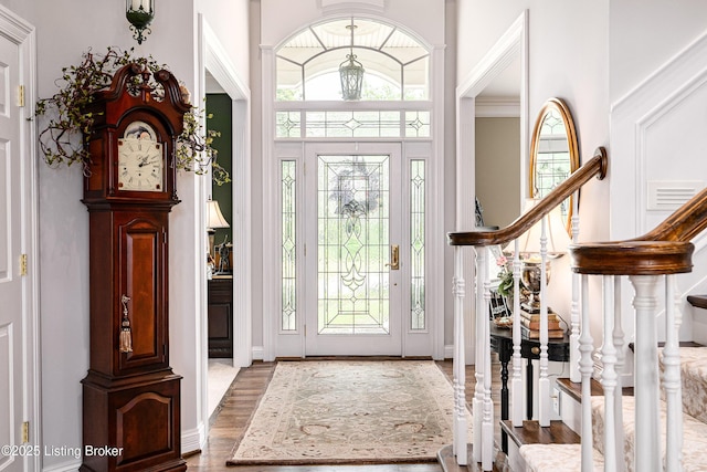 15018 Forest Oaks Dr, Louisville, KY 40245 - entryway featuring wood finished floors and stairway