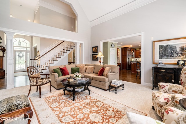 15018 Forest Oaks Dr, Louisville, KY 40245 - living room featuring crown molding, stairway, high vaulted ceiling, and decorative columns
